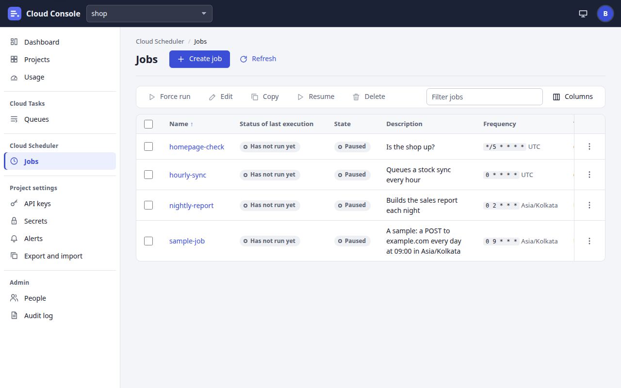 The jobs list with sample-job paused